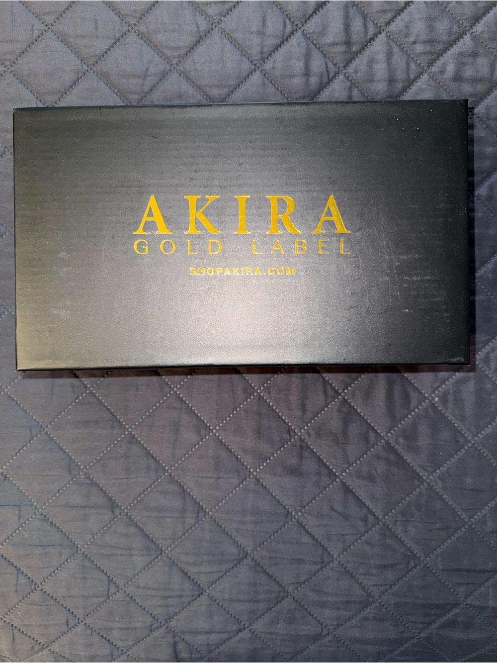 AKIRA Black Box with Gold Label Logo